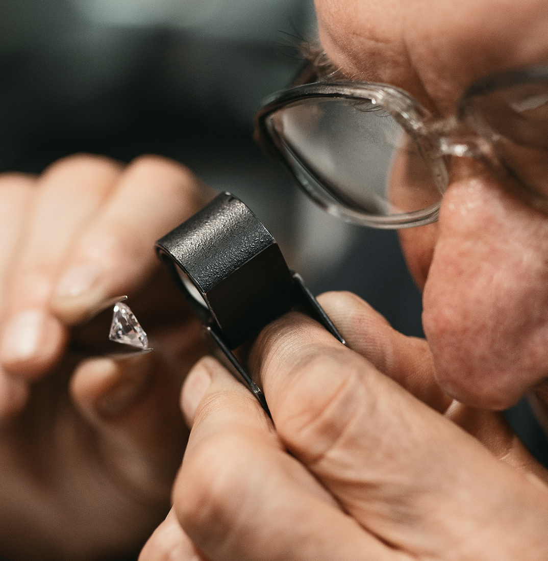 male-jeweler-working-shop-with-magnifying-glass-1-12x